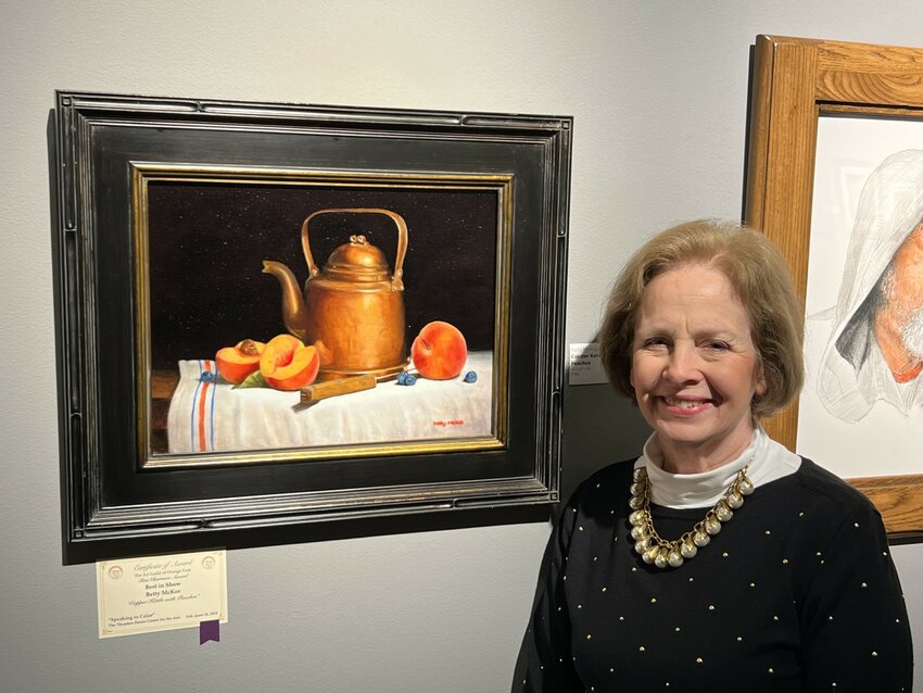 Betty McKee&rsquo;s &quot;Copper Kettle with Peaches&rdquo; won Best in Show for Orange Park.