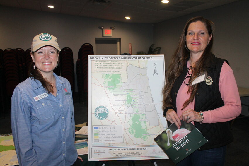 Heather &quot;Feather&quot; Barnes (left) stands with Kim Hall to present the O2O conservation plan.
