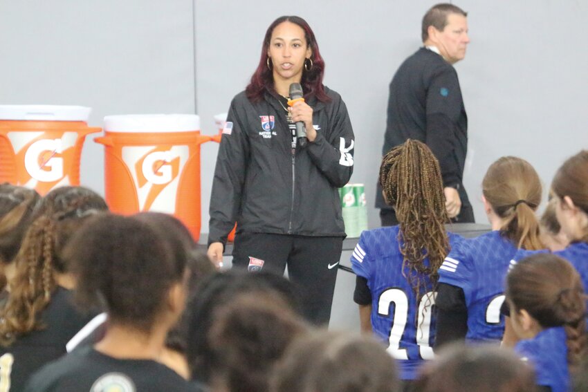 USA Womens Flag Football National team member Deliah Autry, a grad of state champion Tampa Robinson, chats with the more than 40 teams at Jaguars Flag Football Preseason Invitational.