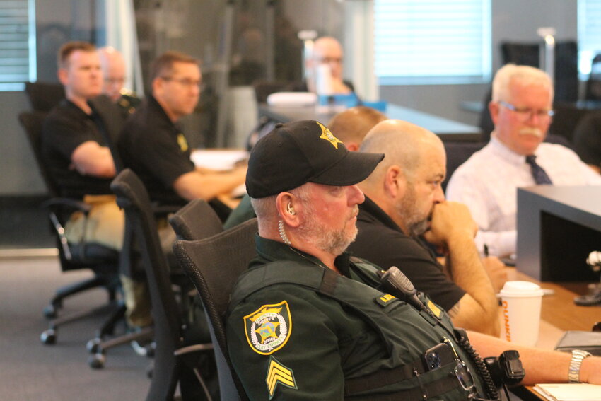 CCSO deputies listen in during the briefing.