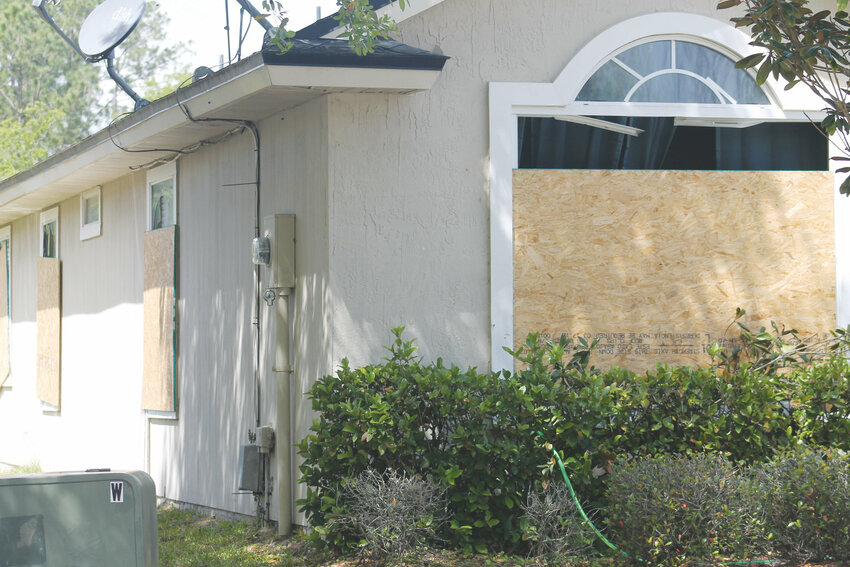 The house in the Secret Harbor neighborhood five years ago, following the raid