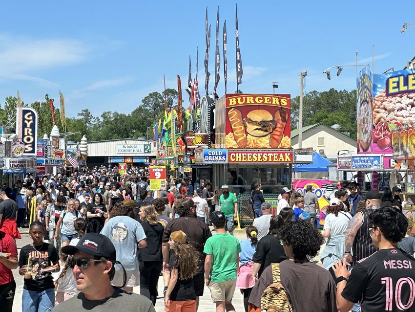Attendance for the Clay County Agricultural Fair picked up significantly Saturday, and with it, so did appetites along the food court midway.