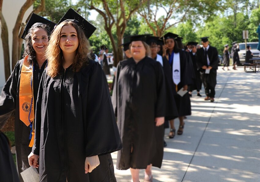Mother Shannon Jacobsen, left, and daughter, Erin, both earned their Associate of Arts degrees at St. Johns River State College&rsquo;s Orange Park campus.