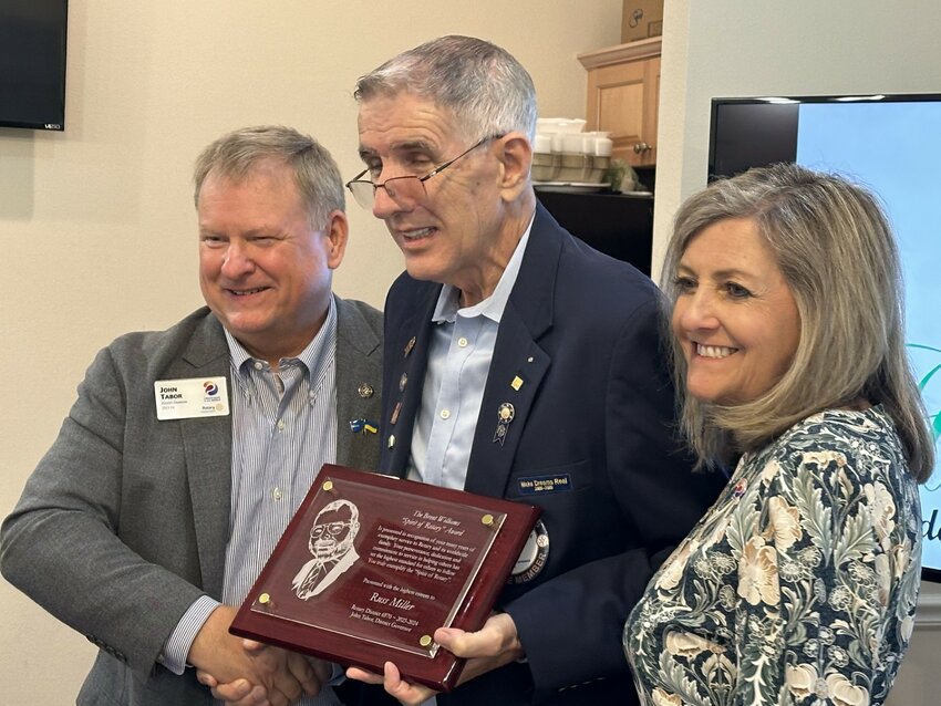 District Governor John Tabor joined D. Brent Williams Spirit of Rotary Award winner Russ Miller and former District Governor Jeanette Loftus during Monday's Green Cove Springs Rotary meeting.