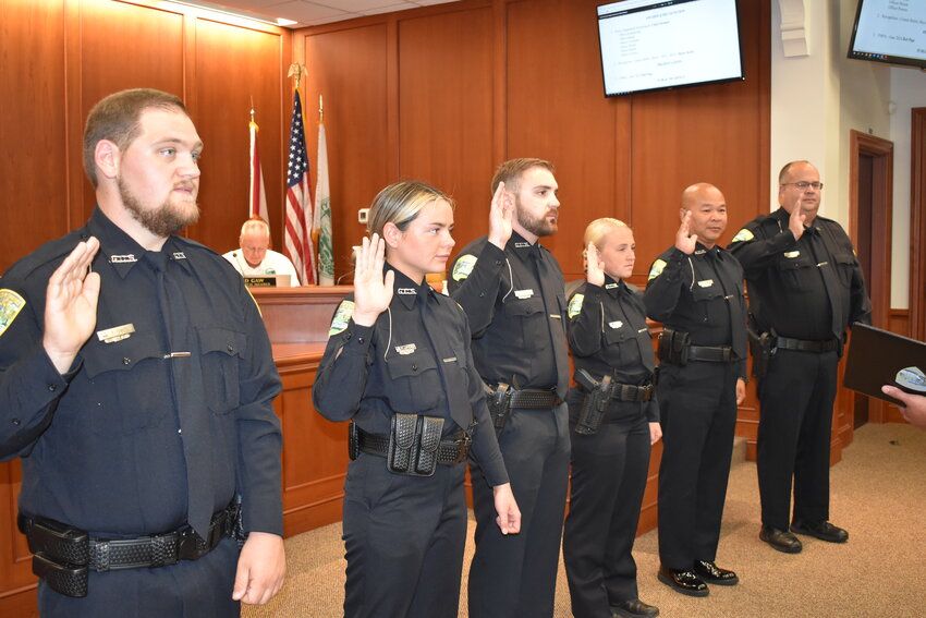 From left, Preston Powers, Madison Lombardi, Tyler Heard, Sarah Hoeger-Holien, Jeff Kummoung and Matthew Waller were sworn in as new officers for the Green Cove Springs Police Department during Tuesday night's City Council meeting.