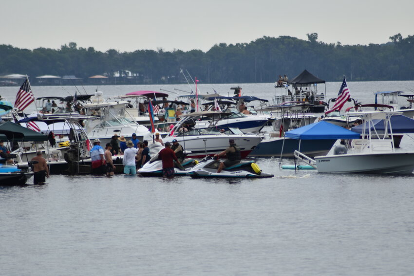 Revelers arrived before daybreak and stayed all day for Boater Skip Day at Bayard Point.