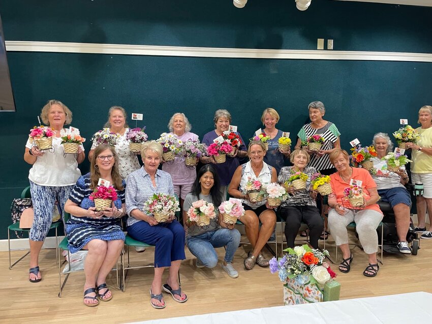 Members created beautiful arrangements for National Garden Week, and many were donated to Pruitt Healthcare.