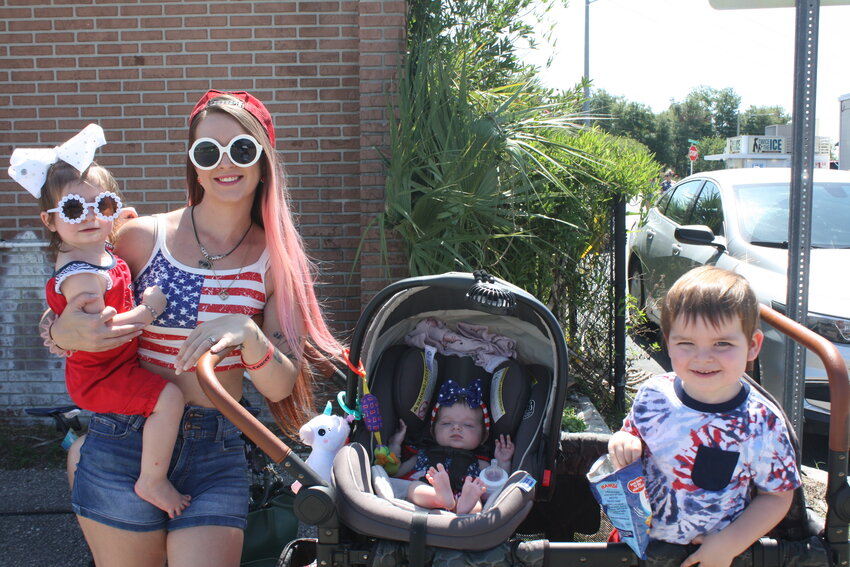 Fourth of July parade All-America-clad family.