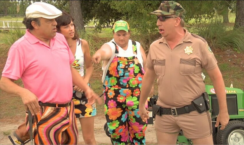 Paul Rodriguez, left, is photographed at the Magnolia Golf and Country Club during the filming of the spoof, 