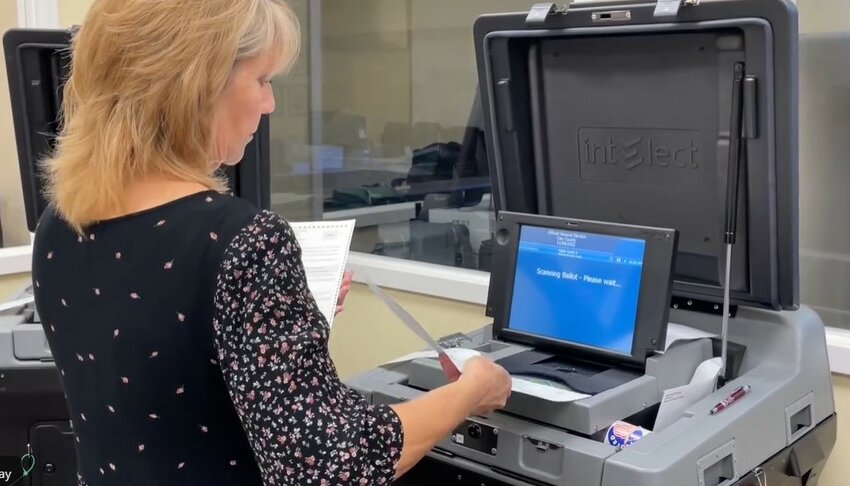 After the polls close, officials at the Supervisor of Elections Office tabulate the results.