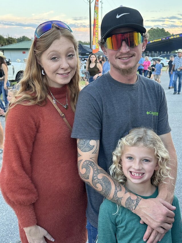 Jessica Killian, Michael Cornish and Emma were happy to be at the Clay County Pro Rodeo .Saturday night. Emma said she was eager to see the 