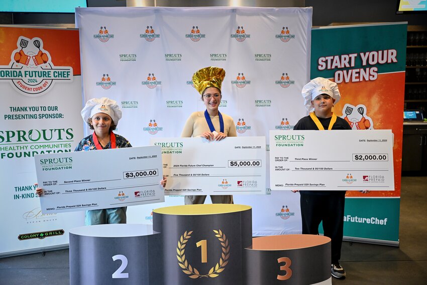 Landon Brown, left, earned a $3,000 Florida Prepaid 529 Savings Plan scholarship for finishing second at the Florida Future Chef championship finals.