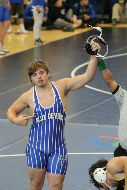 Clay High 215 wrestler Aaron Stacy got wins against Middleburg, at 285 against Middleburg's Joshua Harris, and Charlotte with a pin at 215 in Blue Devils Class 2A Final Four finish; a win in region finals against the Broncos but a loss to Charlotte in state semifinal.
