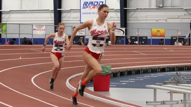 Florida Southern track runner Emma Mussante, a Middleburg High grad, powers through school record setting mile during RADD College Invitational in Gainesville.