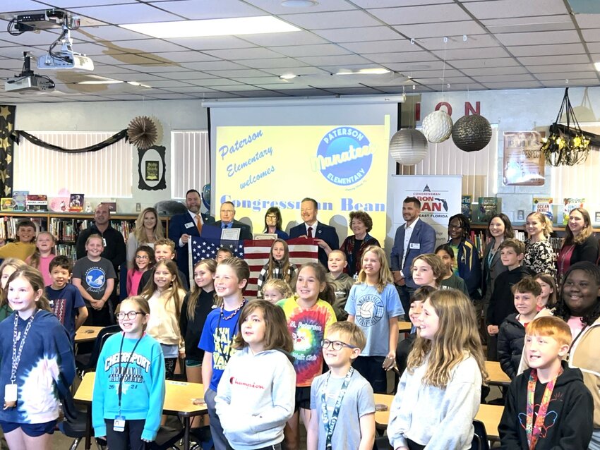 U.S. Rep. Aaron Bean, who represents Clay County in Washington, D.C., was at Orange Park and R.M. Paterson Elementary Schools last week after they were ranked No. 1 and 10 statewide by the Florida Department of Education. Bean talked to fourth-grade classes, presented both schools with a U.S. flag that flew over the U.S. Capitol and provided sweet treats. For more information, see the story on Page XX.