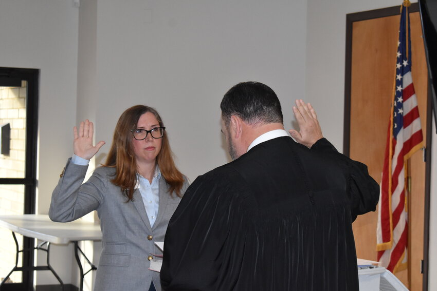 Rachel Fox when she was sworn into her position on the Clay Soil and Water Conservation District Board last month by Judge Ray Forbess.