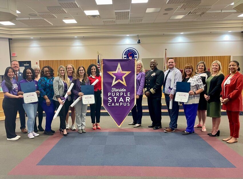During a presentation at the school board meeting, Swimming Pen, Oakleaf Village and Coppergate elementaries were recognized as recipients of the Florida Department of Education's Purple Star School of Distinction Designation.