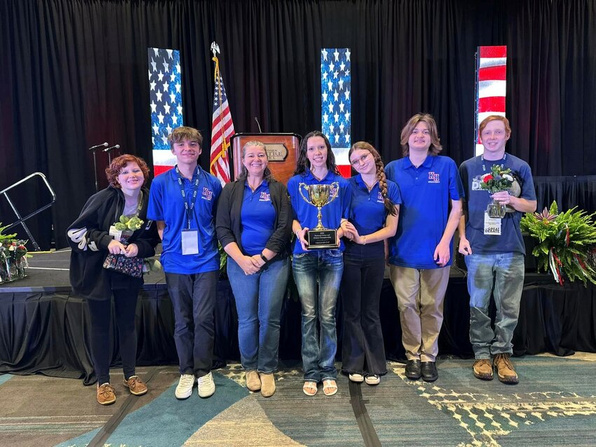 From left: Olivia McCoy, Seth Preseau, Shannon Southam, Erabella Conant, Mikayla Turner, Benjamin Mann and Joseph Gale at The Great Debate.