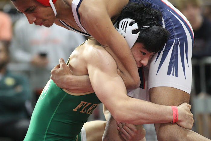 Fleming Island senior 150 wrestler Laird Duhaylungsod moved into the round two championship bracket at the FHSAA Class 2A championships along with a large contingency of Clay County athletes. Wrestlers continue with consolations and round two championship matches plus semifinal on Friday with state finals scheduled for Saturday afternoon in Kissimmee's Silver Spurs Arena.