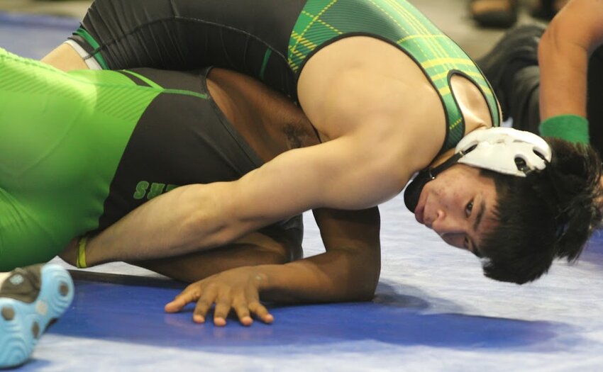 Fleming Island 150 wrestler Laird Duhaylungsod moved swiftly through his championship bracket with this 4-3 win over North Miami's Charly Sainteus.