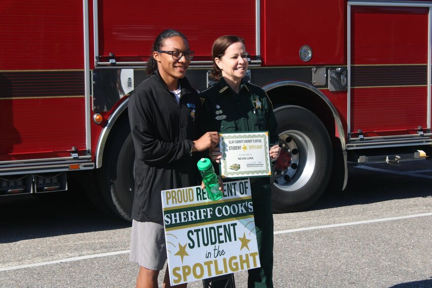 Clay County Sheriff Michelle Cook presented Oakleaf Junior High School student Nevin Luna with the Student in the Spotlight award, an initiative dedicated to recognizing young people who have done great things in their community.