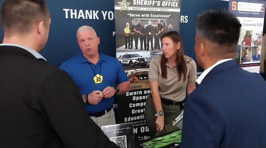 Representatives of the St. Johns County Sheriff’s Office speak with job seekers during THE PLAYERS’ annual Military Job Fair.