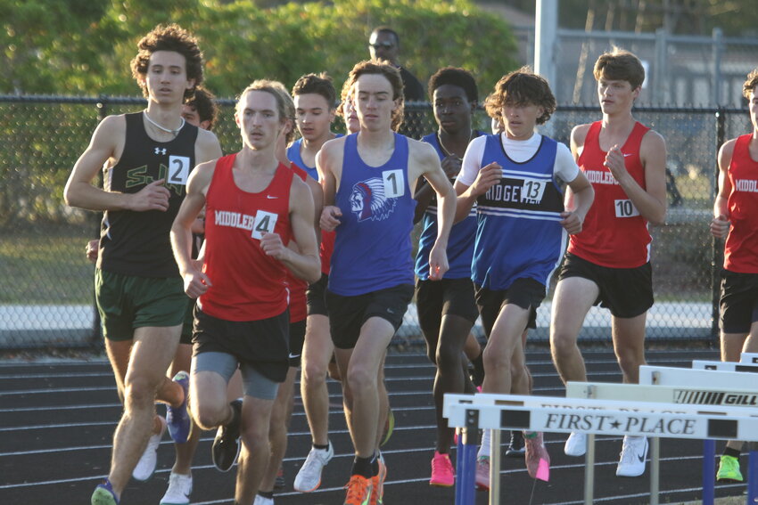 The boys 1600 meters race gets going at the Panthers Invitational track meet held at Ridgeview on Thursday, March 6. Winner was Keystone Heights' James Thomas in 5:02.95.