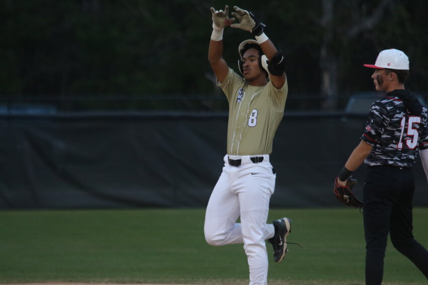 Oakleaf High batter Jeter Farina finished this two run double in the third inning to give Knights (9-9) a 3-0 lead over Middleburg on Monday, March 24 as Knights pushed to an 11-0 win. Farina, standing next to Middleburg second baseman Ethan Karaim, accounted for five runs for Oakleaf.