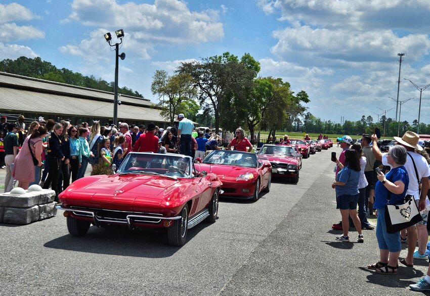A raft of classic cars slowly motored to the fairgrounds' front gate Thursday during the Clay County Agricultural Fair's opening ceremony.