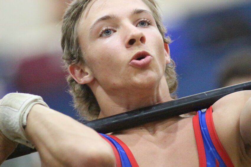 Keystone Heights 119 weightlifter Elijah Mize readies for lift at region championships won by Indians in Olympics with a second place in Traditional. Mize and teammate Colton Hollingsworth were both Olympics and Traditional individual champions as area teams head to state championships in Lakeland April 11-12.