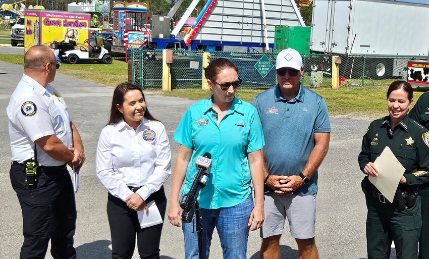 Tasha Hyder, Clay County Agricultural Fair executive director, addresses questions during a press conference at the fairgrounds.