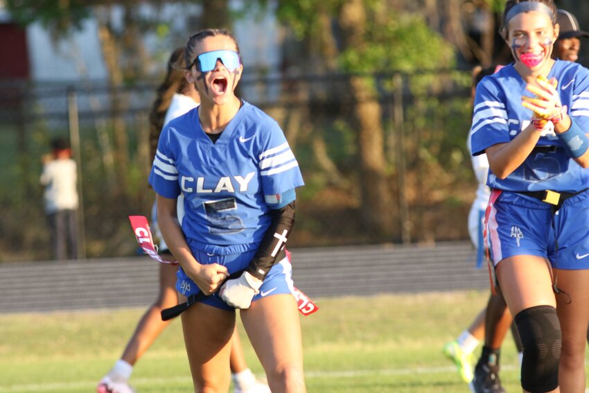 Clay High flag footballathlete Cora Parker yells as final whistle blows in Blue Devils thrilling 7-6 district final win over Ridgeview.