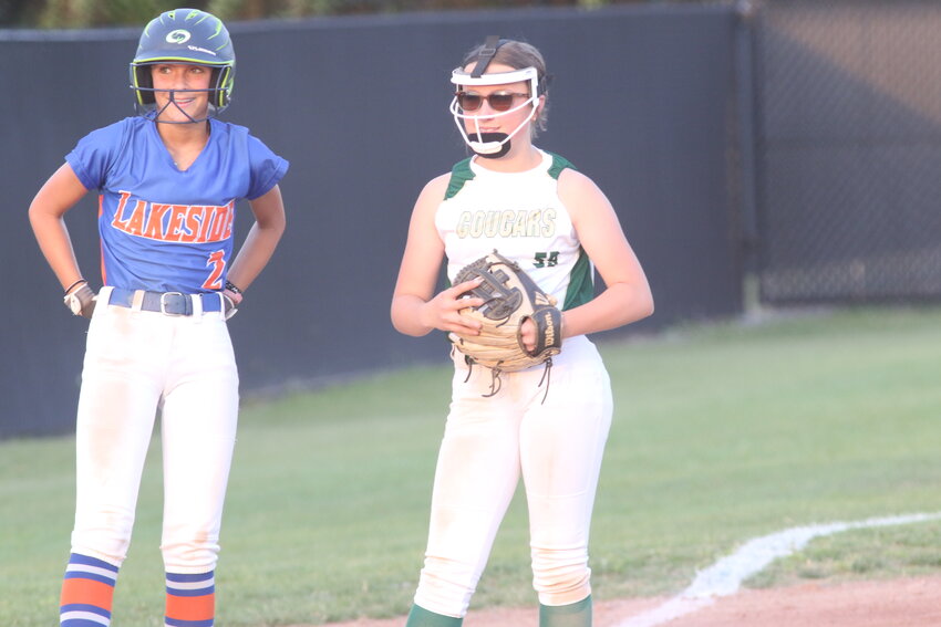 Lakeside defeated Green Cove Springs 12-2 in their NEFAC semifinal; here with Lakeside's Paige Courson at third base with Cougar third baseman Hadlee Glisson.