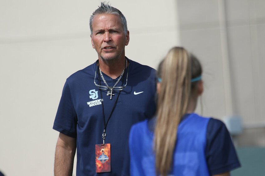 St. Johns Country Day School girls soccer coach Mike Pickett was selected as the Class 1A Florida Dairy Farmers coach of the year for his state title over The Pine School.