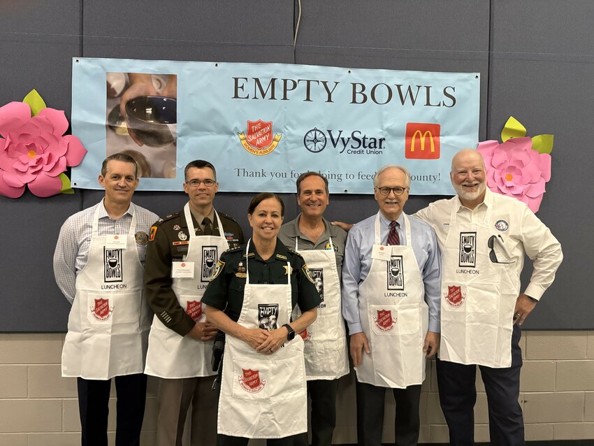 Commuity leaders Property Appraiser Tracy Drake, Camp Blanding Post Cmdr. Col. Todd Hopkins, Sheriff Michelle Cook, County Manager Howard Wanamaker, attorney David King and Supervisor of Elections Chris Chambless were guest servers for the event.