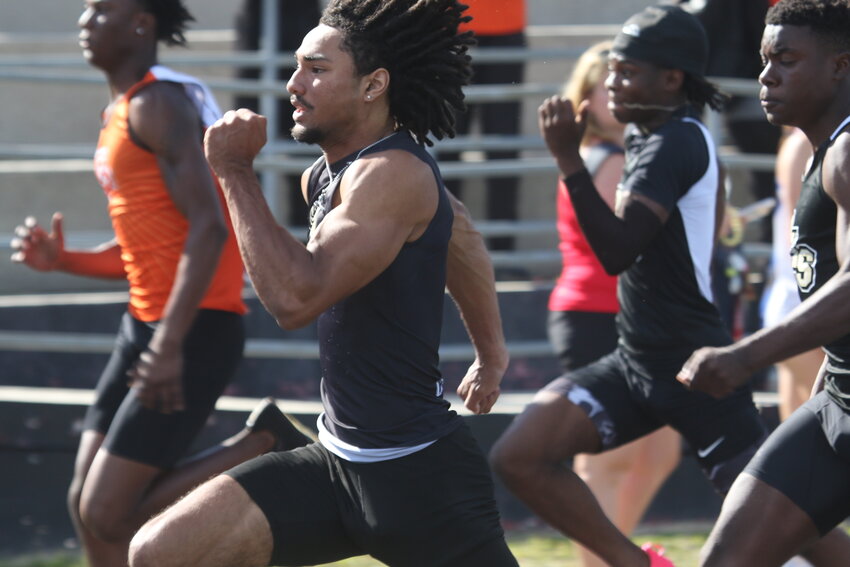 Oakleaf High senior trackster Devin Collins, here in the 100 meters at the recent Don Hall Invite at Orange Park High, won his region 1-4A long jump title on Saturday at Seminole High School and will be in the region 100 as well.