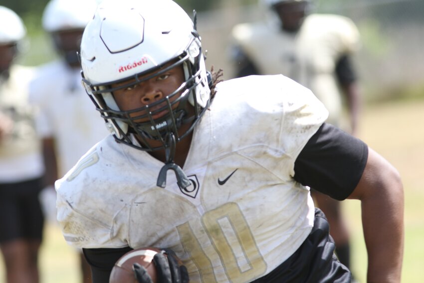 Oakleaf had one of the  more rugged and tough to bring down with one tackler ball carriers in Chris Foy II, who now heads to Edward Waters College and there are plenty of big bodies in the Knights' backfield in week one including C.J. Moses here.