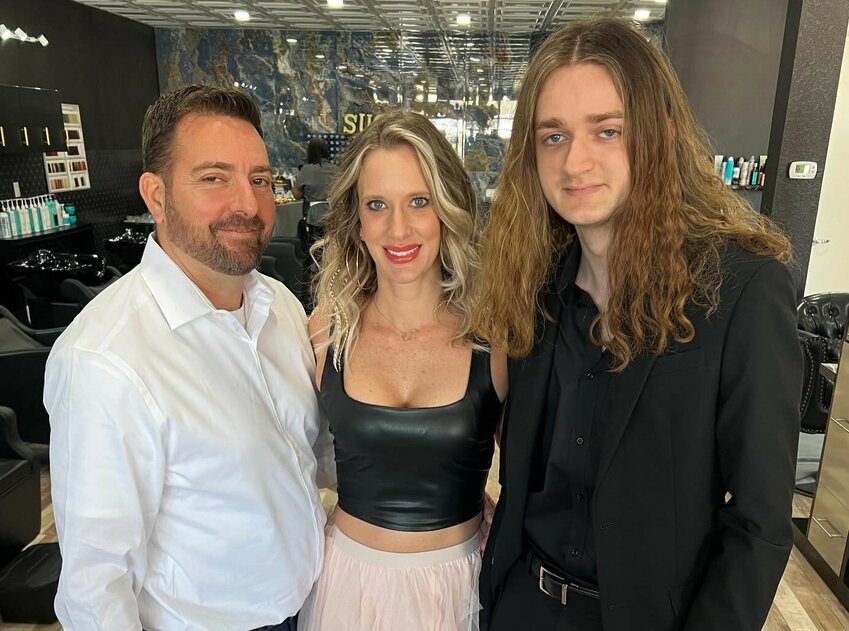 Jennifer Hawk, co-owner of Bleach Please Salon, with husband Marc and son Anthony.