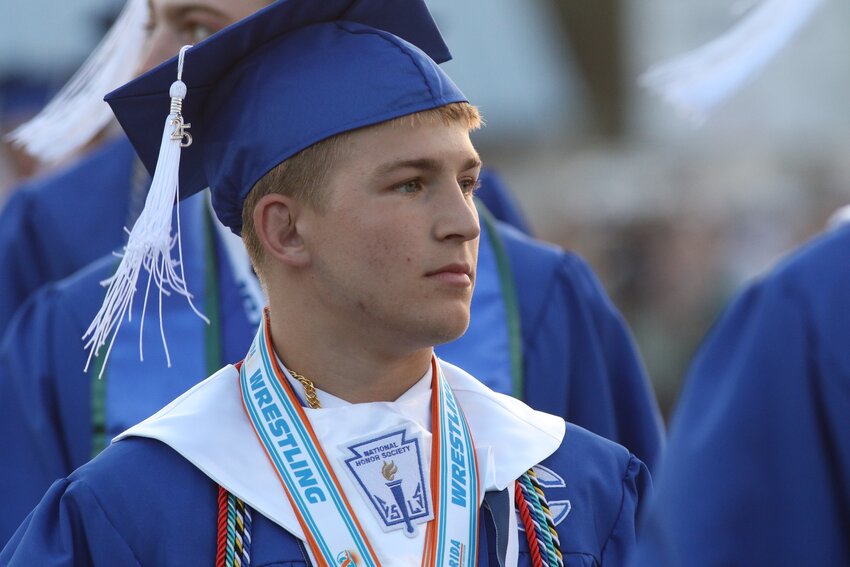 Clay High wrestler Jacob Bucci leads out his Blue Devil graduates at Friday's ceremony. Bucci was  double medalist for his Clay wrestling career.