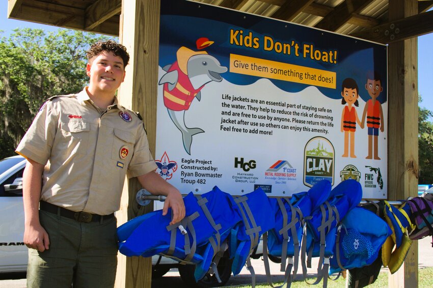 Ryan Bowmaster is with the only &quot;Kids Don' Float&quot; life jacket rack in Clay County at the Knight's Boat Ramp and Marine boat ramp at Black Creek.