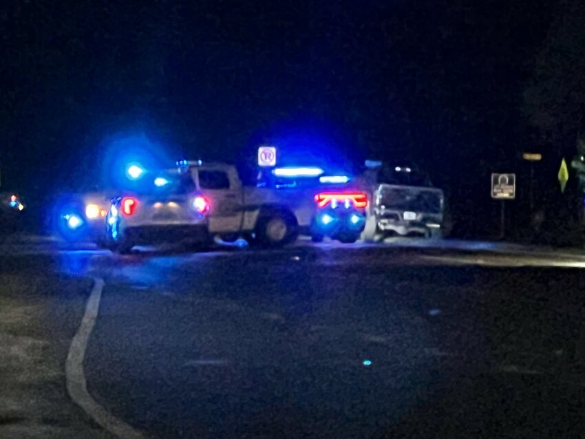 Emergency crews blocked the roadway while providing aid and investigating the crash shortly after midnight Thursday.