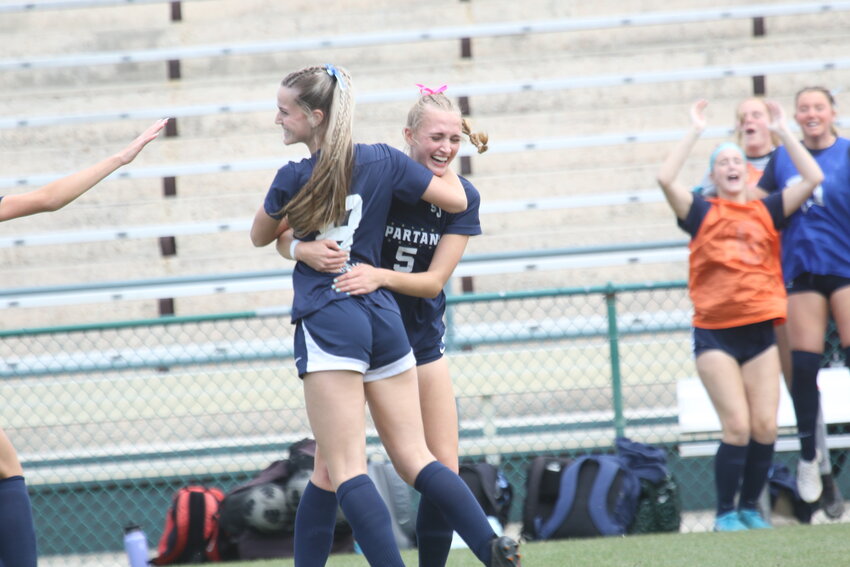 St. Johns Country Day School girls soccer returned to state title status with their 4-0 win over The Pine School with a balanced team led by two Dairy Farmer selections; Mia Johnson and CeCe Nowicki, both here celebrating Nowicki's goal in the 4-0 win.