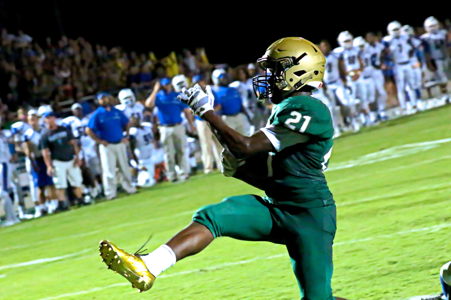 Returning senior tailback Anfernee McCaskill caused fits for Clay defense with his outside sweeps getting yards including this high-stepping touchdown in the first half that put Fleming Island uip 21-7.