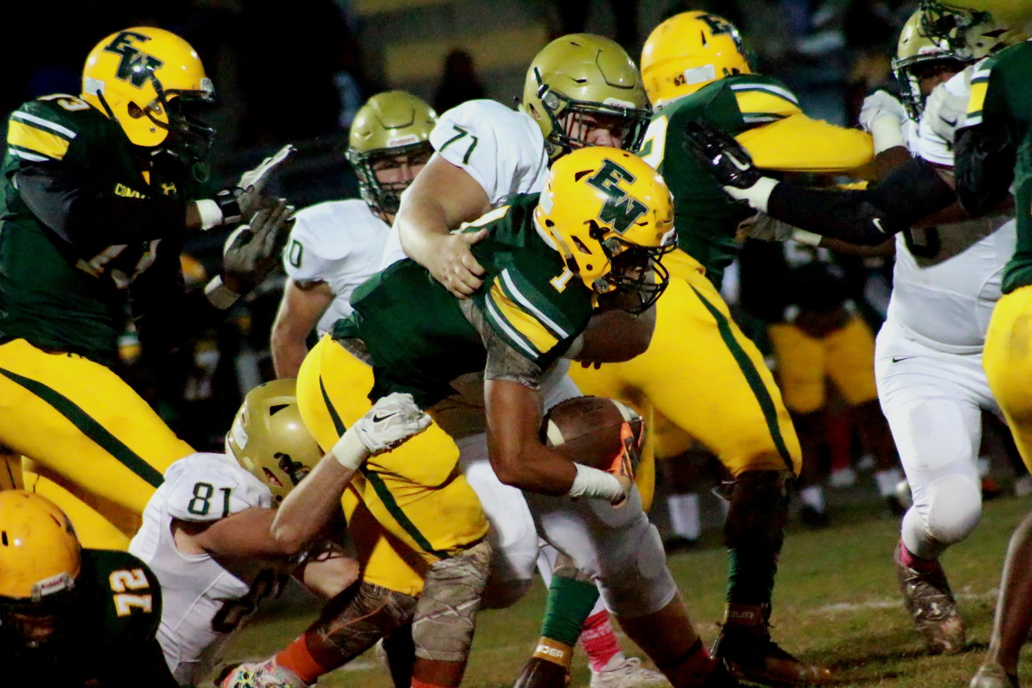 Fleming Island defensive linemen Jake Libretto, No. 81, and Will Hudgins, No. 71, 
manhandled Ed White ballcarrier in Golden Eagles’ 20-6 win Thursday night.