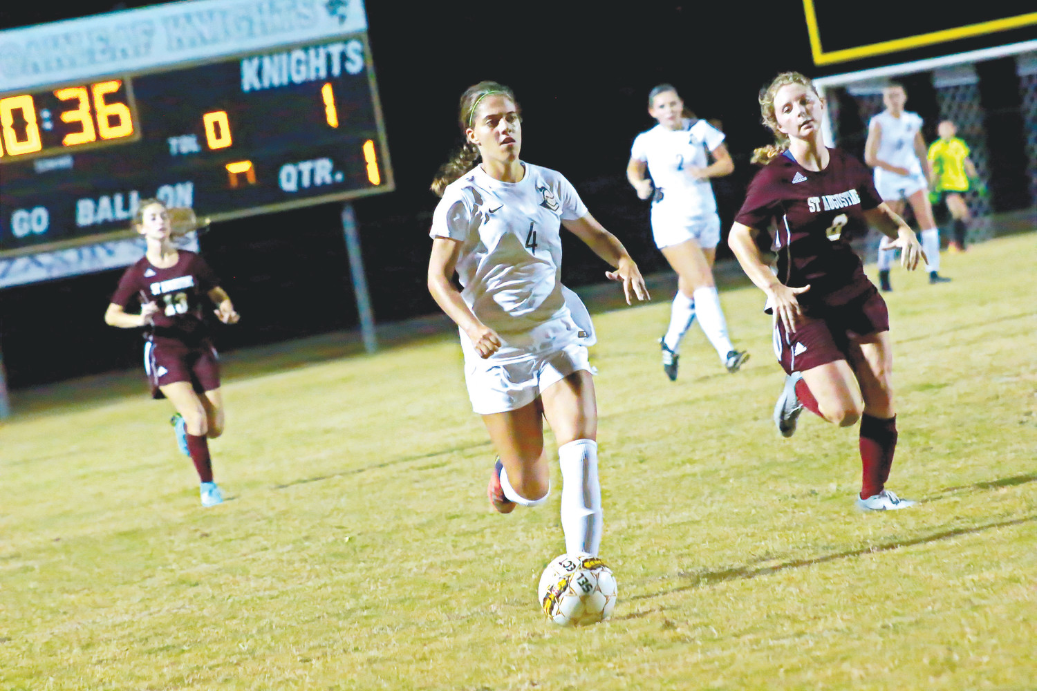 Oakleaf High soccer forward Michelle “K-Smash-Ski” Kanaski flies downfield en route to one of her three goals for Lady Knights in 9-1 season opening district win over St. Augustine.