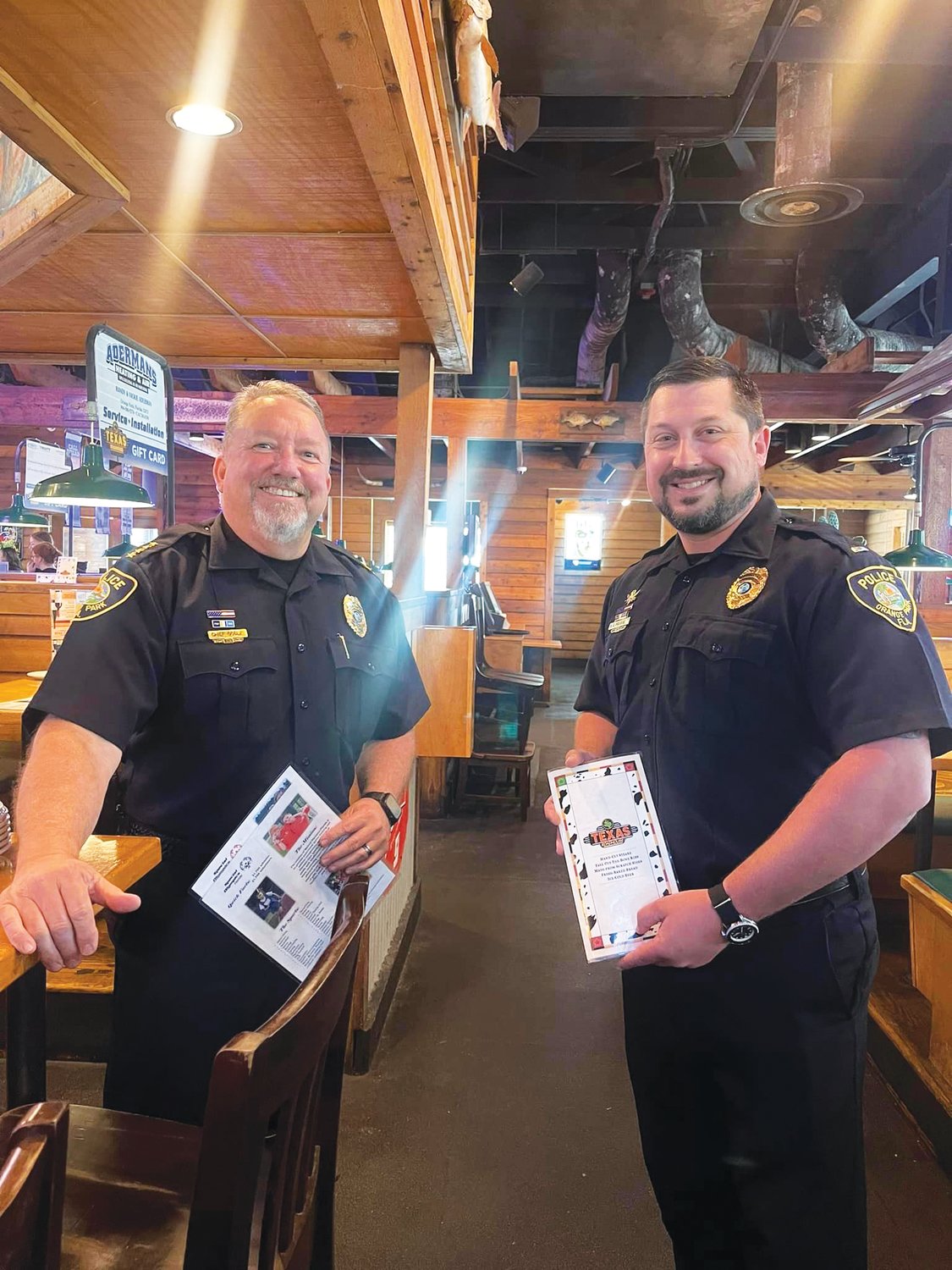 Orange Park Police Chief Gary Goble and OPPD Lt. Cody Monroe joined their law enforcement partners at the sheriff’s office to encourage customers at the Orange Park restaurant to support the county’s Special Olympics Team.