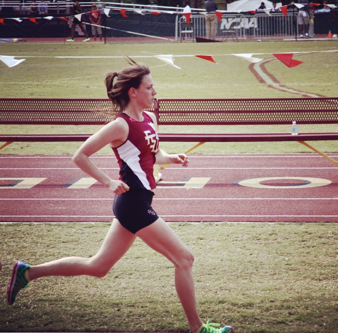 Alexandra Midgett strides in track action as a Florida State University walk-on athlete.