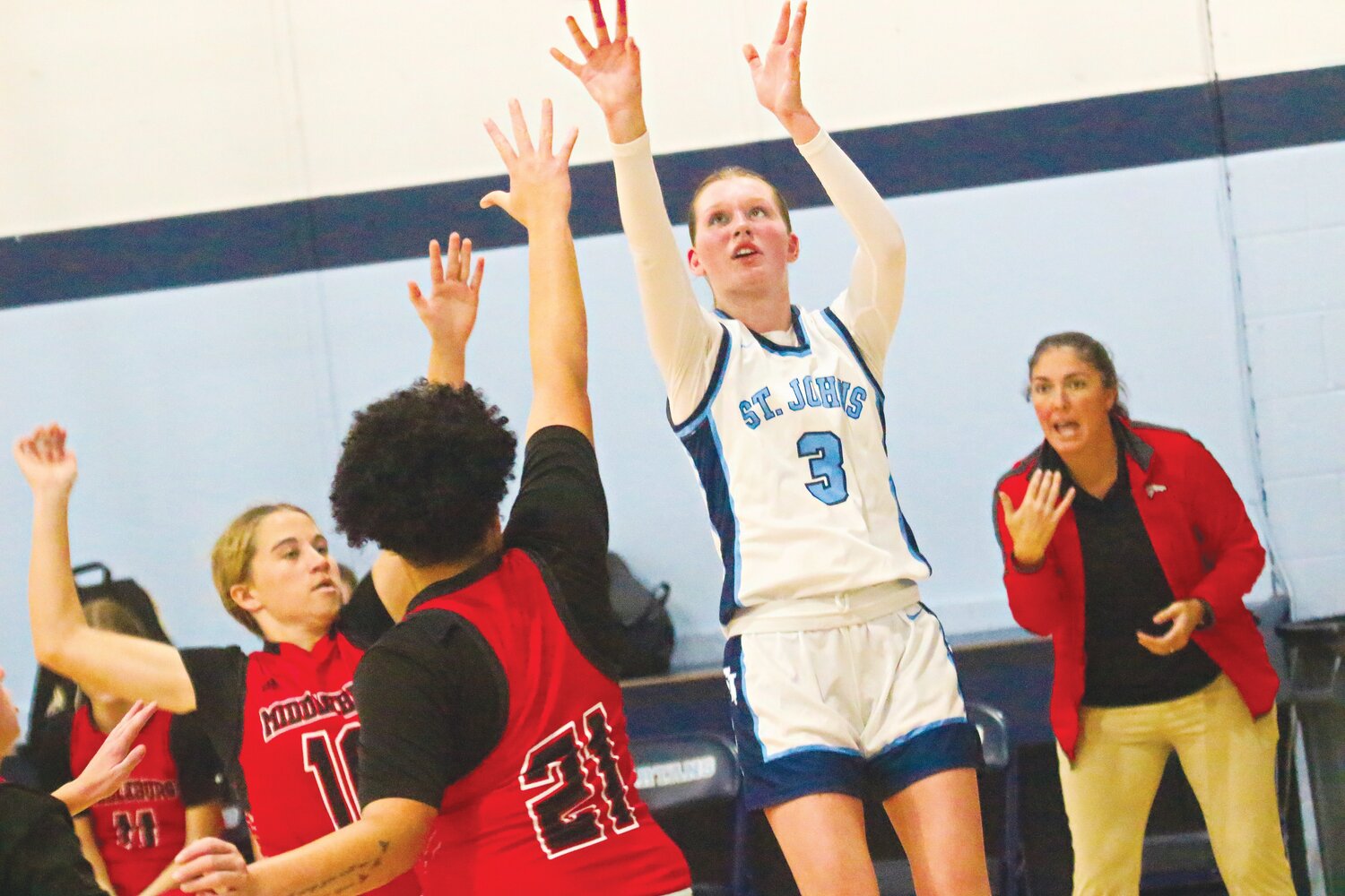 St. Johns Country Day School eighth grader Kendall Proffitt has sharpened her three-point shooting skills to add to the three-way shooting prowess of the Spartans offensive attack; with senior Mary Kate Kent and sophomore Sophia Mejias.