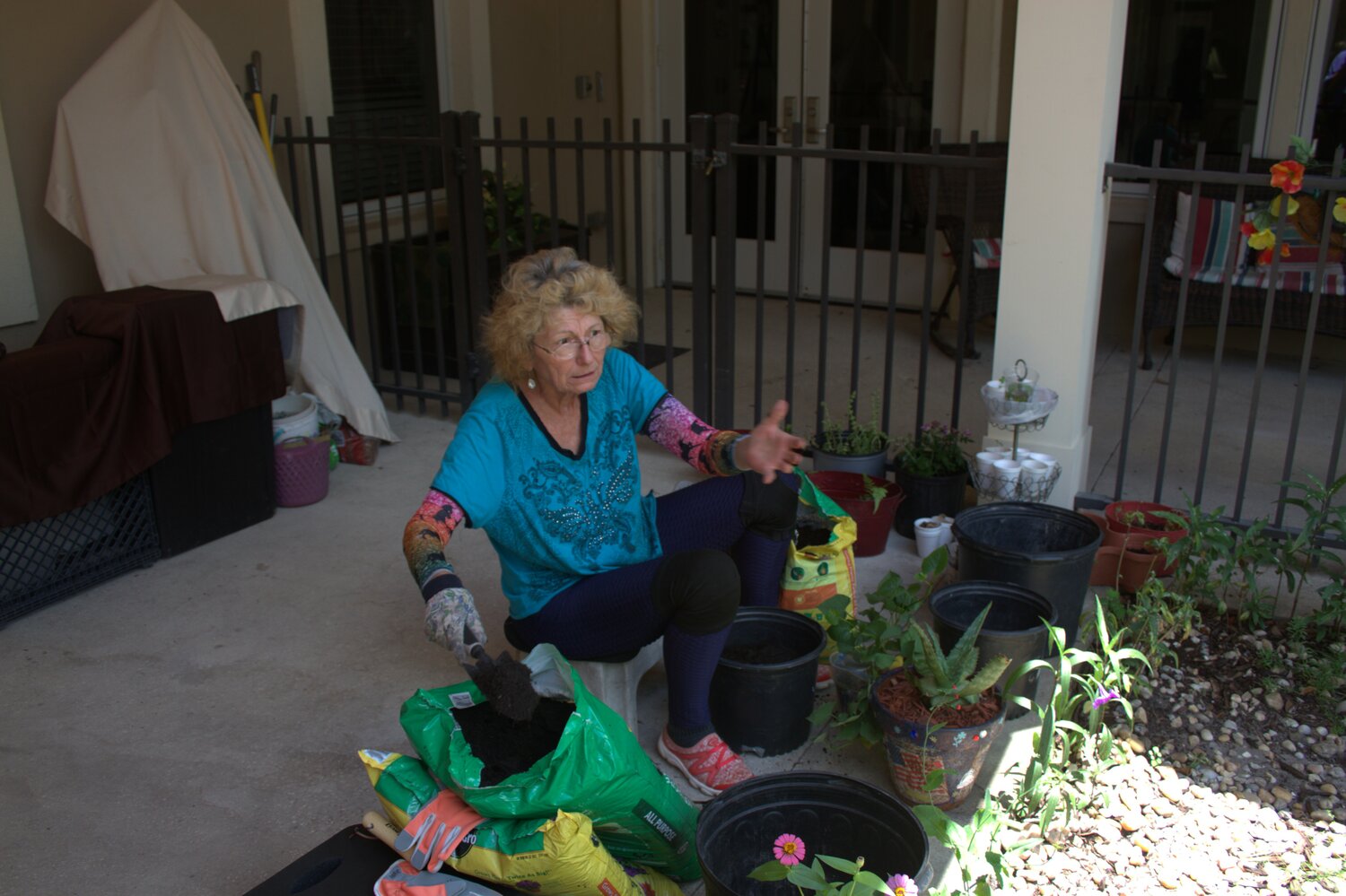 Volunteer at senior center transforms drab spaces into colorful gardens - Clay Today