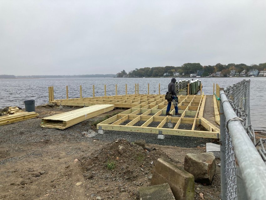 This 2022 photo shows a worker helping build the viewing platform near the boat launch, as part of the Walker Farm Resilience and Revitalization Project. The project is nearly complete — members of the town council recently approved a bid for the installation of a low-profile dock at Walker Farm.